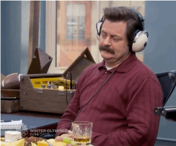Character Ron Swanson wearing headphones.