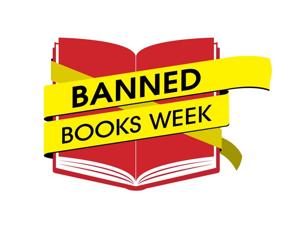red book wrapped in yellow caution tape that reads Banned Books Week
