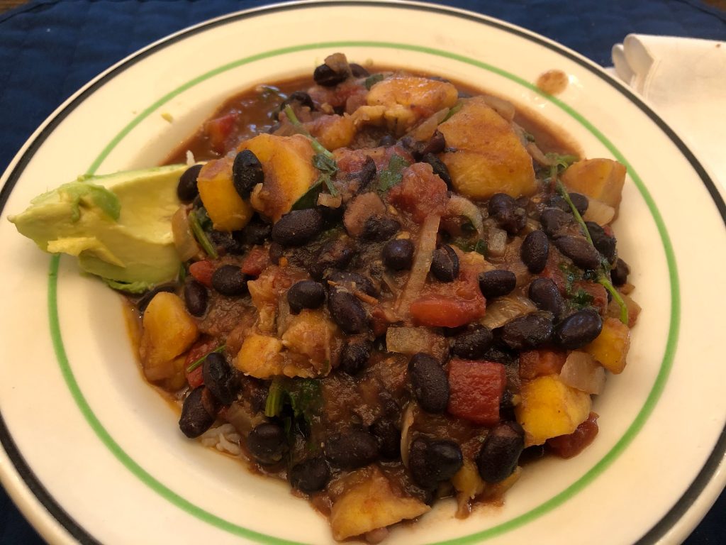 Bowl of smoky black bean and plantain chili.