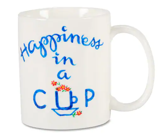 A painted white mug with "Happiness in a cup" and the "u" in cup has illustrated flowers in it