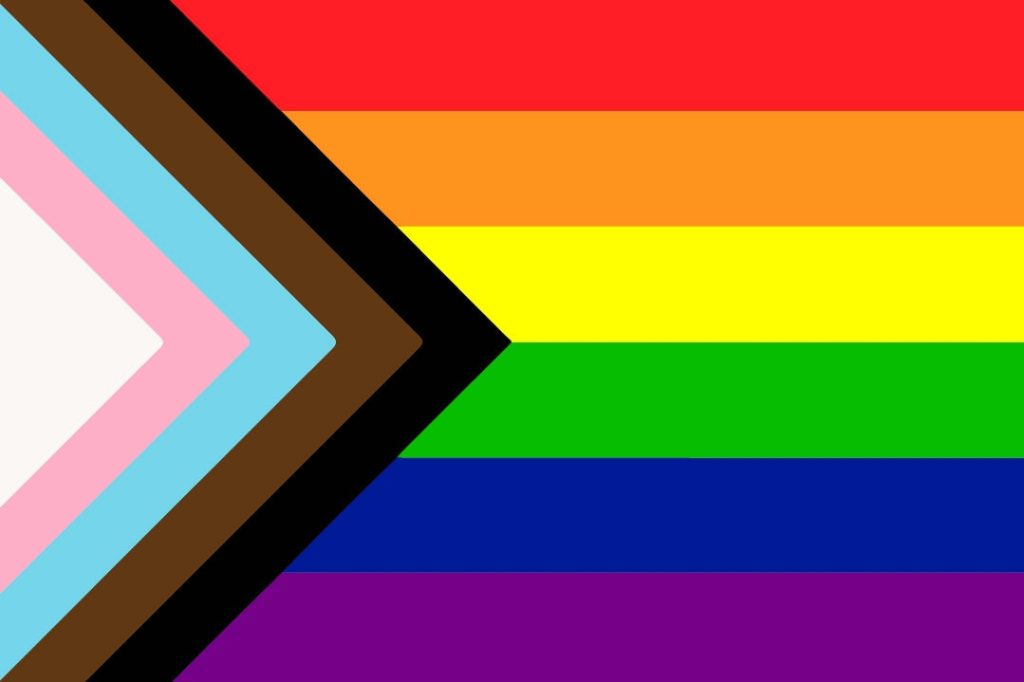 Progress Pride flag incorporating transgender flag and black and brown stripes 